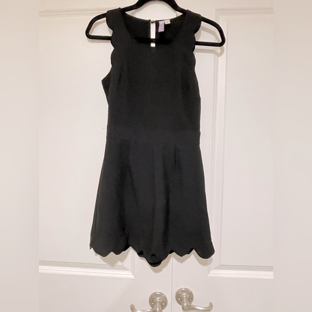 Like new Alya romper with scalloped sleeves